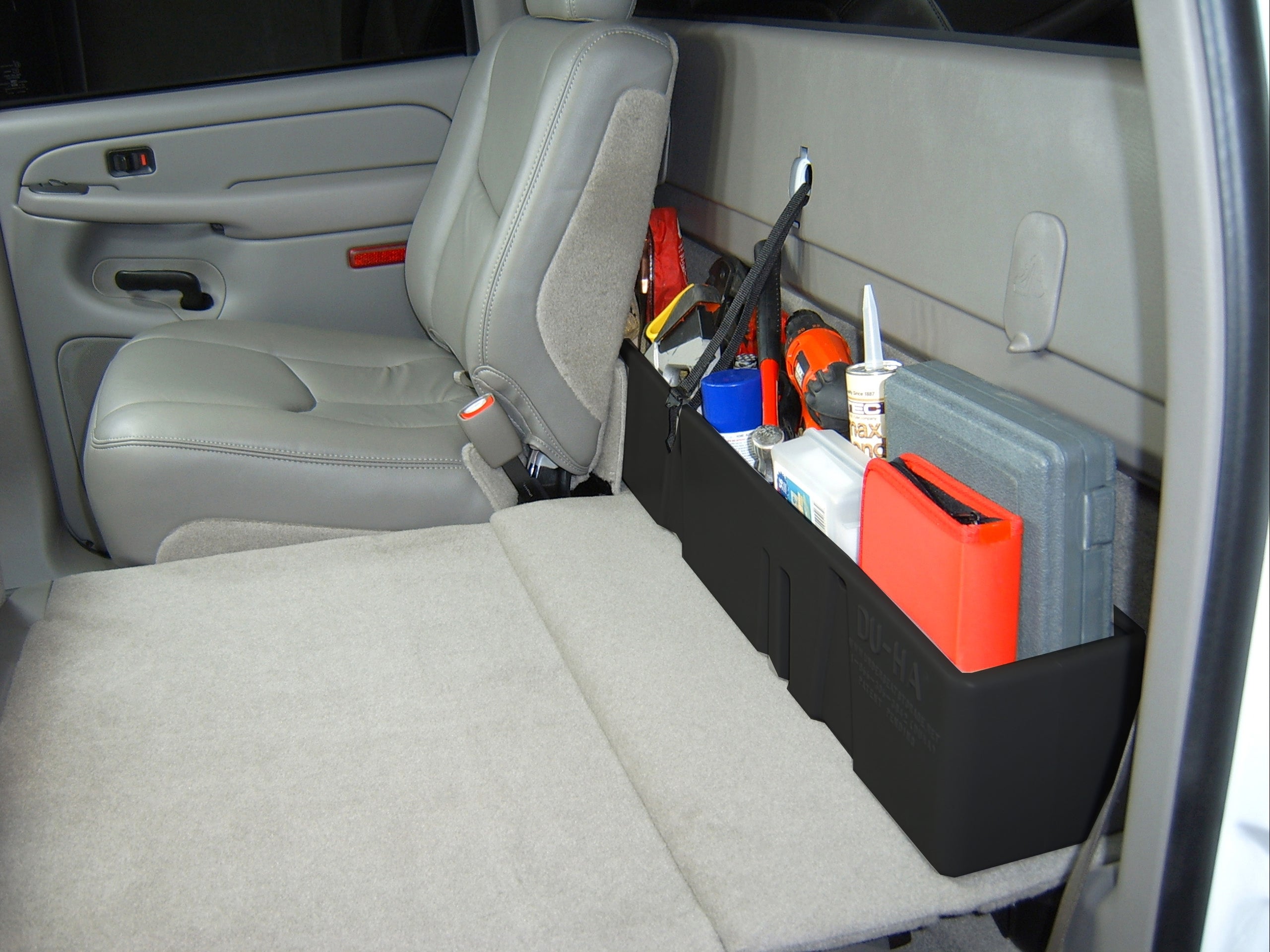 DÜHA behind-the-seat storage installed in a 2000-2007 Chevy Silverado / GMC Sierra HD Crew Cab